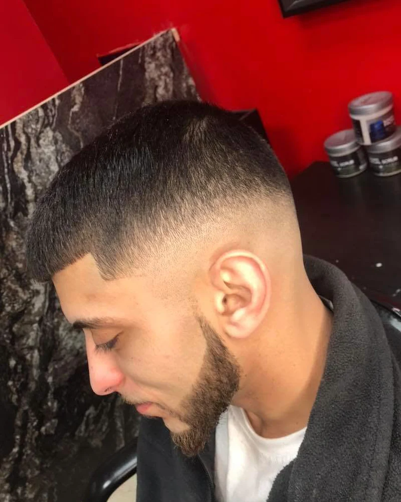 Close-up of a fresh skin fade with a crisp line-up